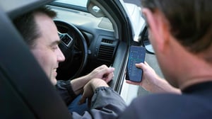 Copy of Looking at a tablet in the back of a truck