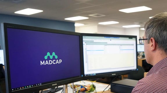 MADCAP on screen in office with Development Manager